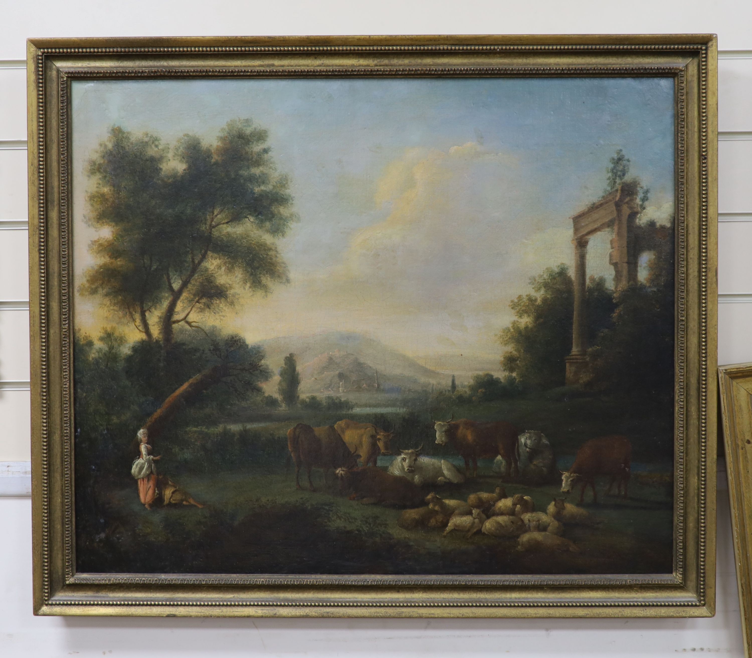 Early 19th century Continental School, oil on canvas, Cattle drover and shepherdess at rest in a classical landscape, 60 x 73cm